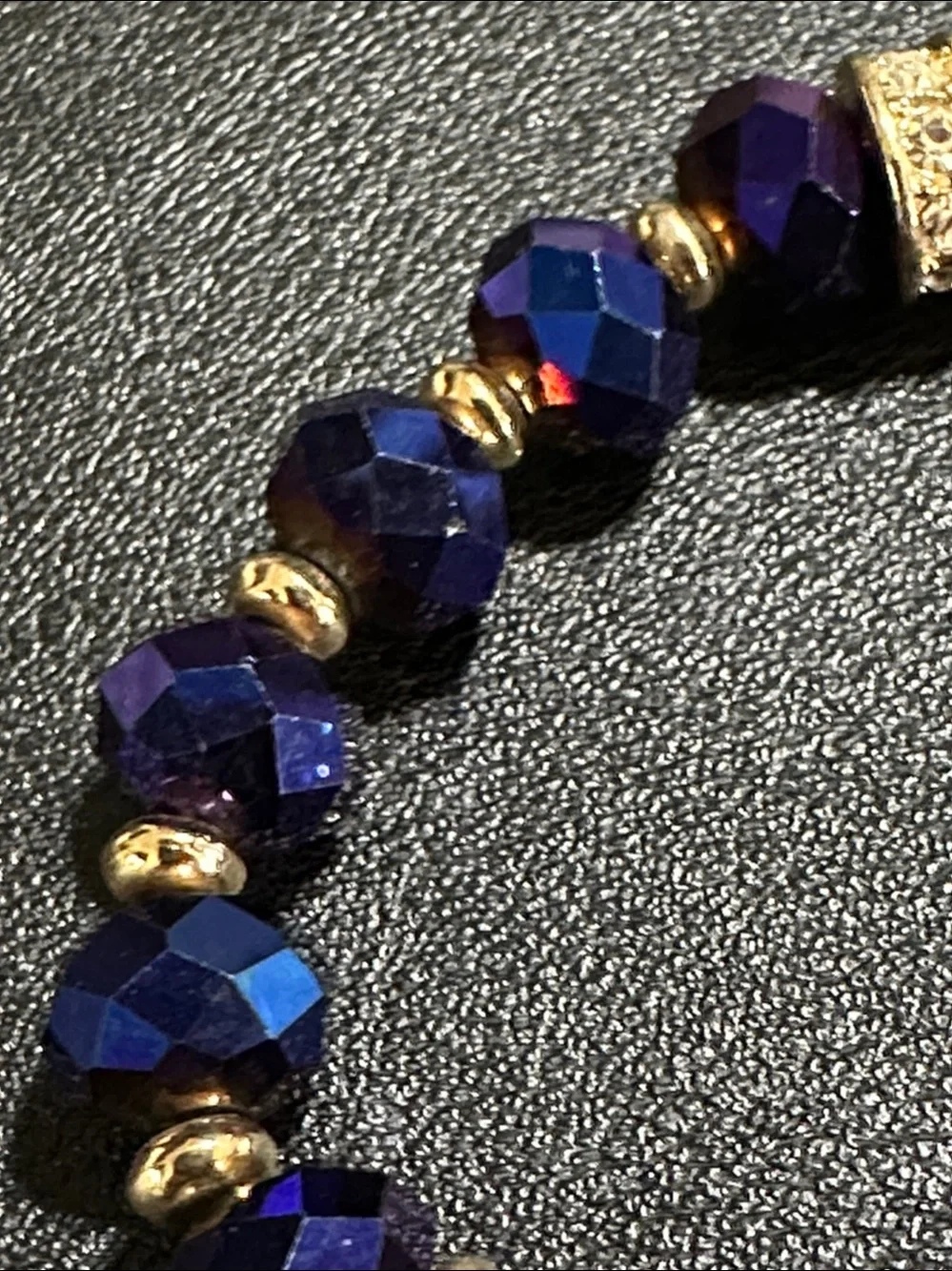 Guess Royal Blue Faceted Crystal Gold Tone Accent Stretch Bracelet